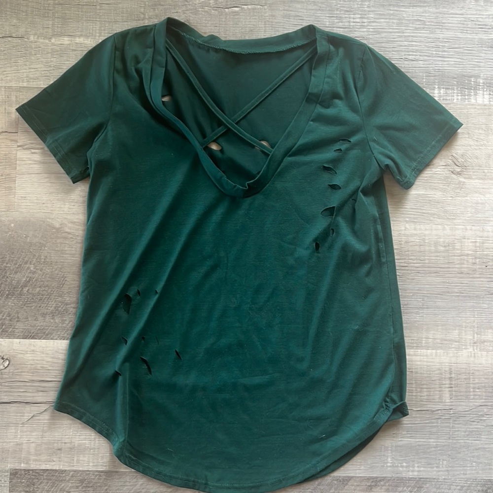 Size small, women’s t-shirt, factory made holes